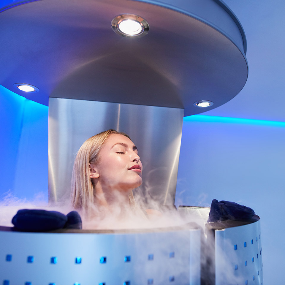 Portrait of a woman in a whole body cryo sauna